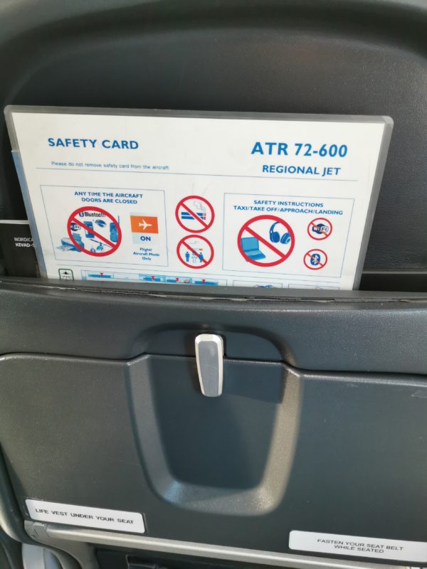 Aircraft seat and safety instruction card