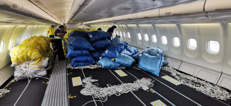 Blue bags in aircraft cabin