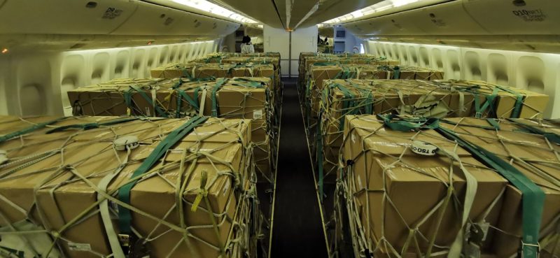 Aircraft cabin full of boxes