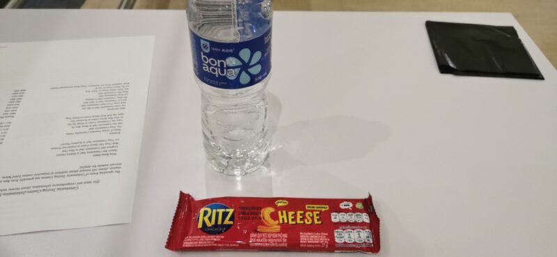 Bottle of water and snack package